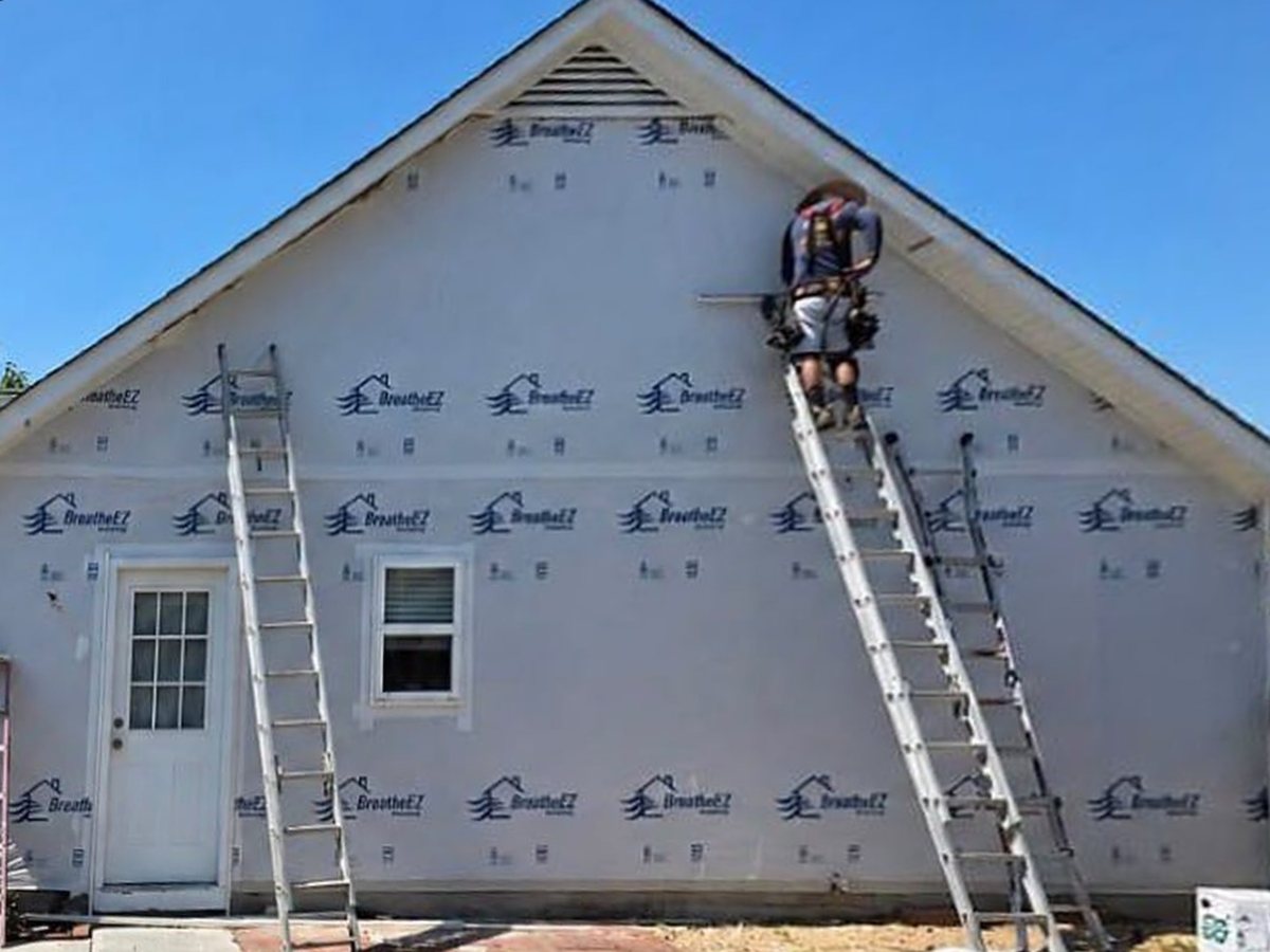 Before: house wrap installation